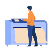 A man is standing in front of a printer.