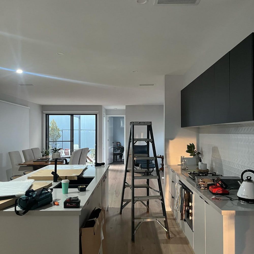 A Kitchen With A Ladder In The Middle Of It — AdvancedOne Electrical in Alfredton, VIC