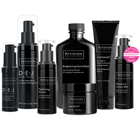 A collection of Revision Skincare products in black bottles.