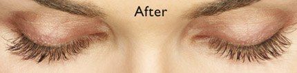 Closed eyelids with long eyelashes; 