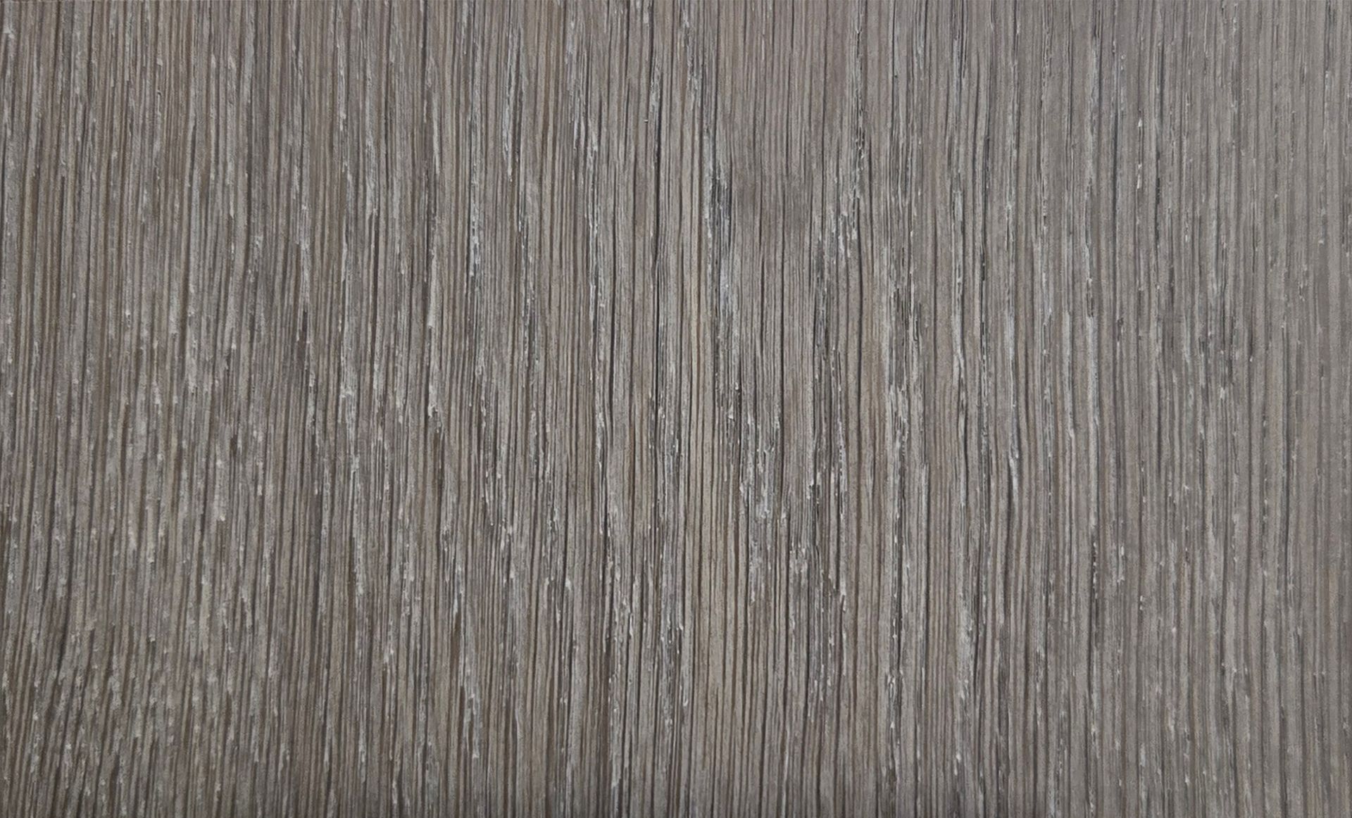 Detalle del piso de madera de ingeniería de la colección Unique en acabado Foggy. Se muestra la veta y la textura.