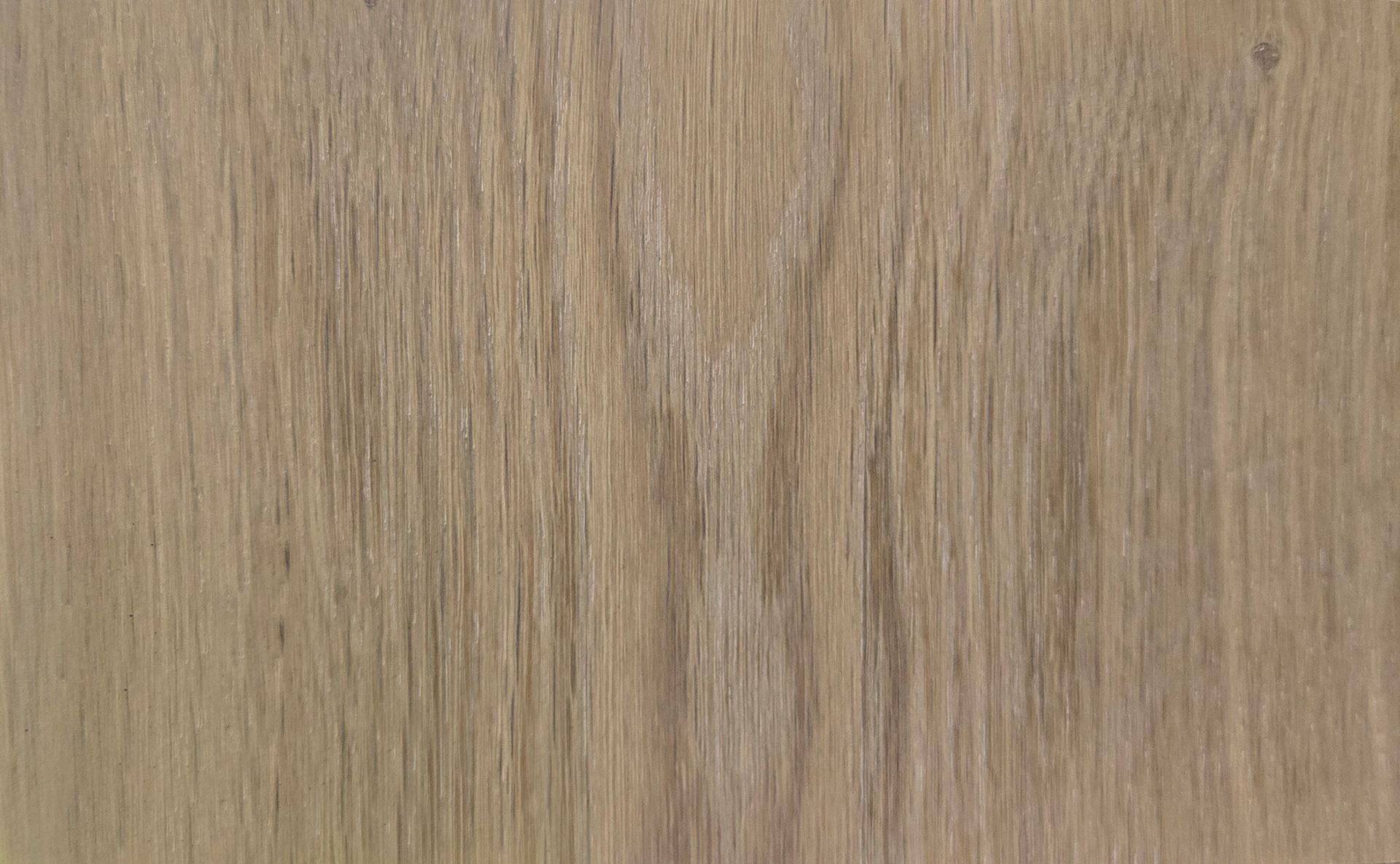 Detalle del piso de madera de ingeniería de la colección Unique en acabado Leather. Se muestra la veta y la textura.