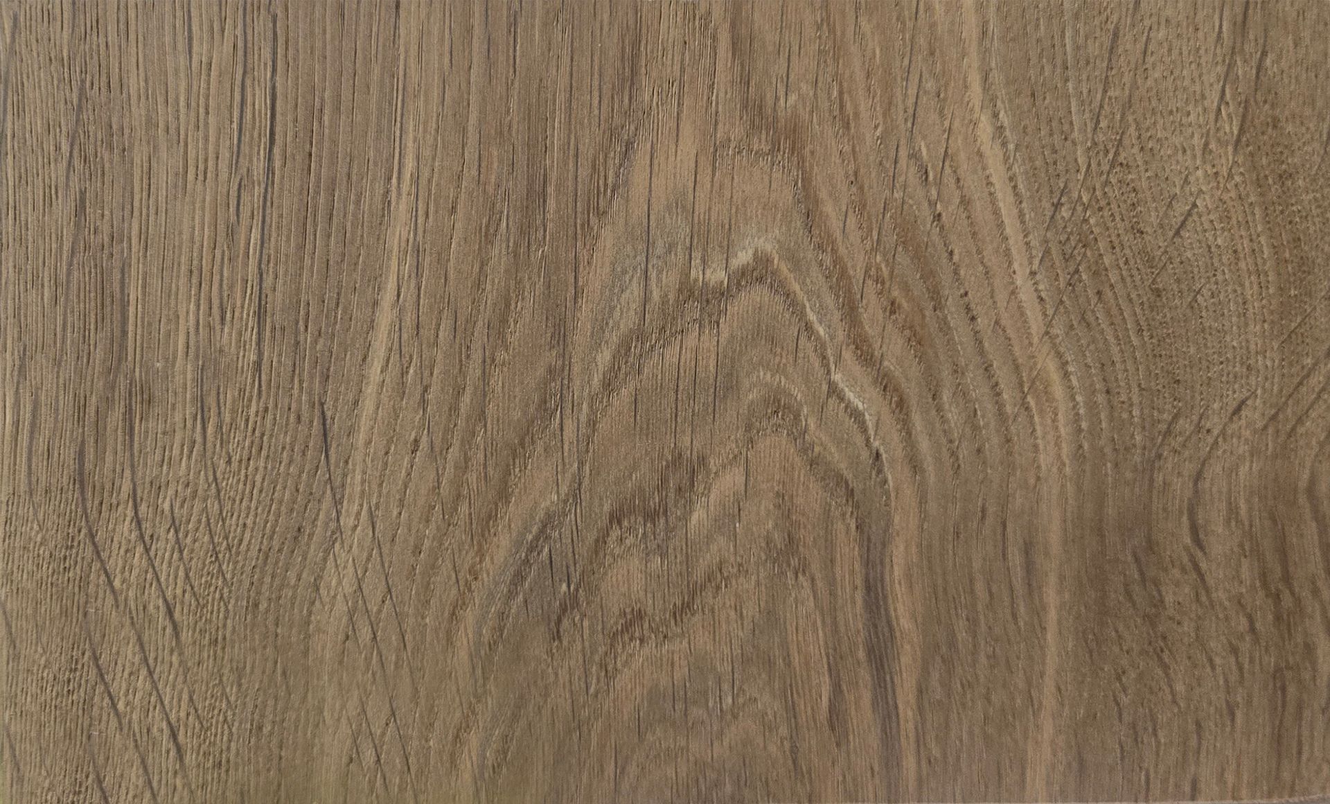 Detalle del piso de madera de ingeniería de la colección Unique en acabado Rusty. Se muestra la veta y la textura.