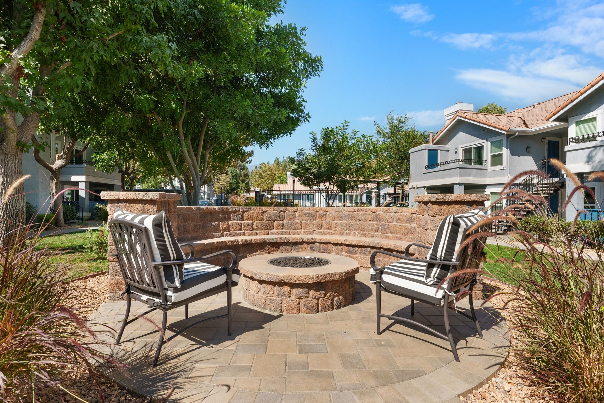 Sliding Photo Gallery Displaying Community Amenities -firepit with chairs