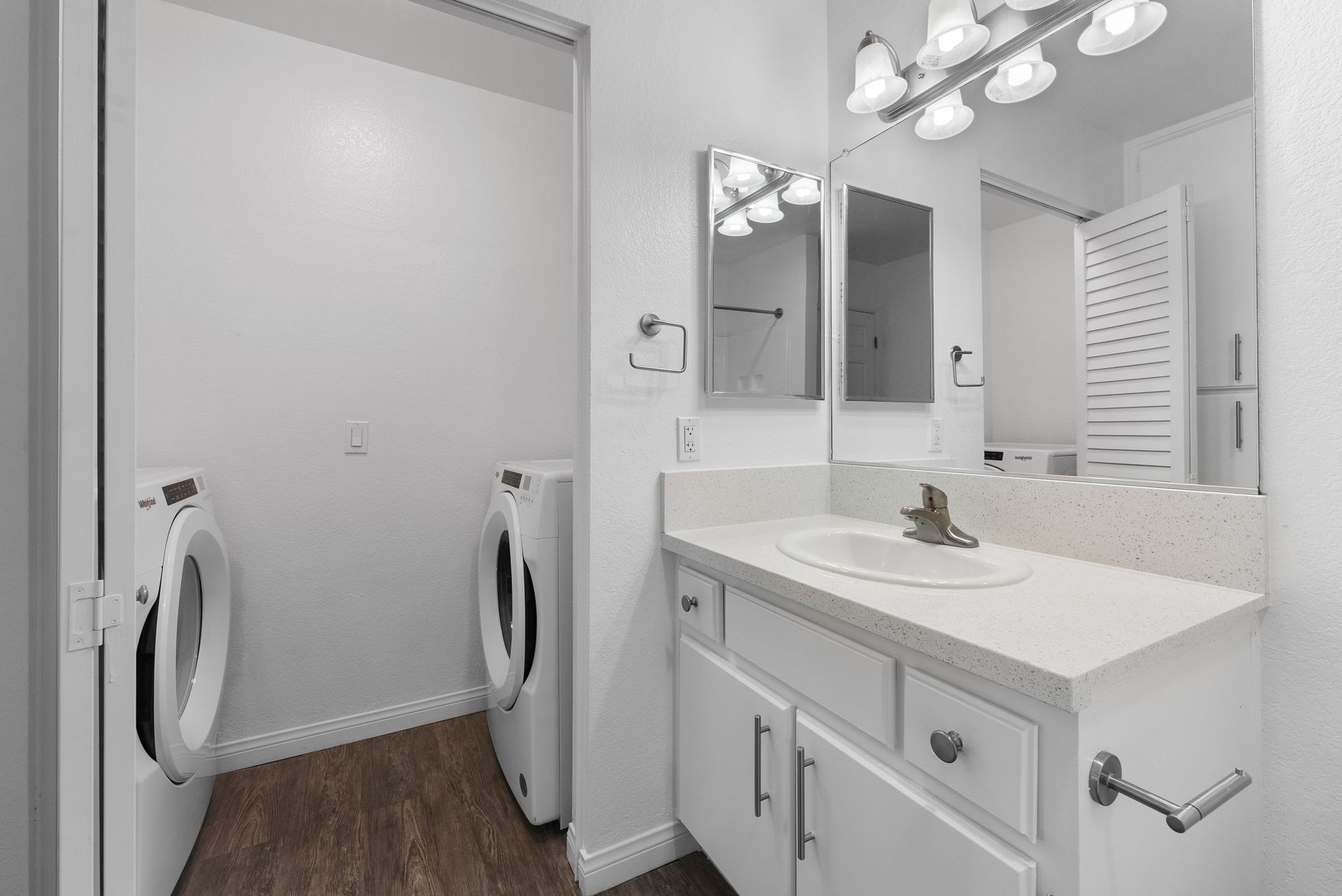 Bathroom with sink and washing machine