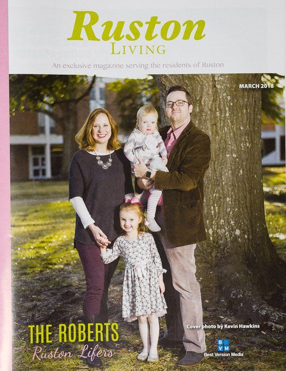 A ruston living magazine with a family on the cover