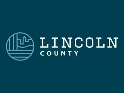 A logo for lincoln county on a blue background