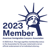 The logo for the american immigration lawyers association shows the statue of liberty.