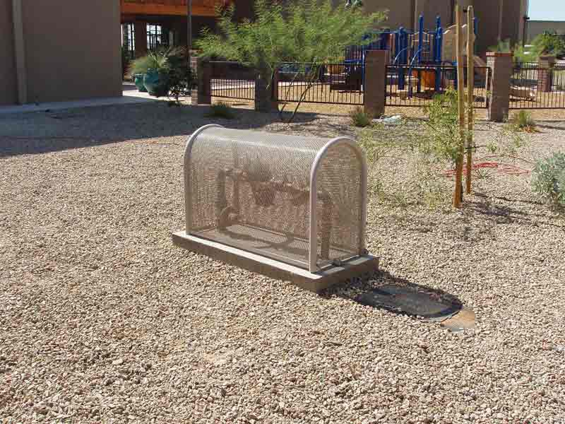 Water meter with cover — Fences in Tucson, AZ