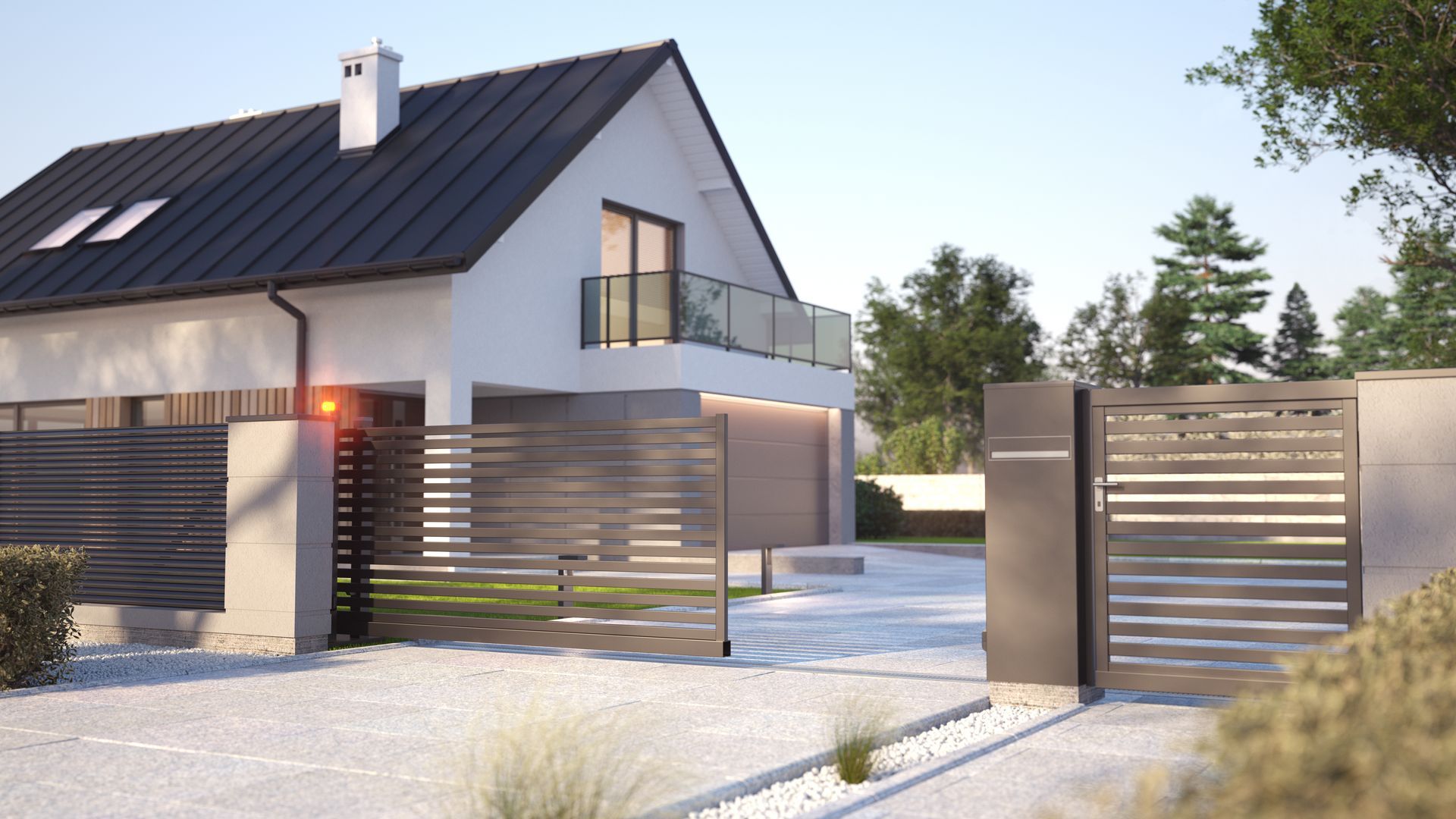 Modern home with a sleek metal driveway gate and fence, featuring landscaped surroundings.