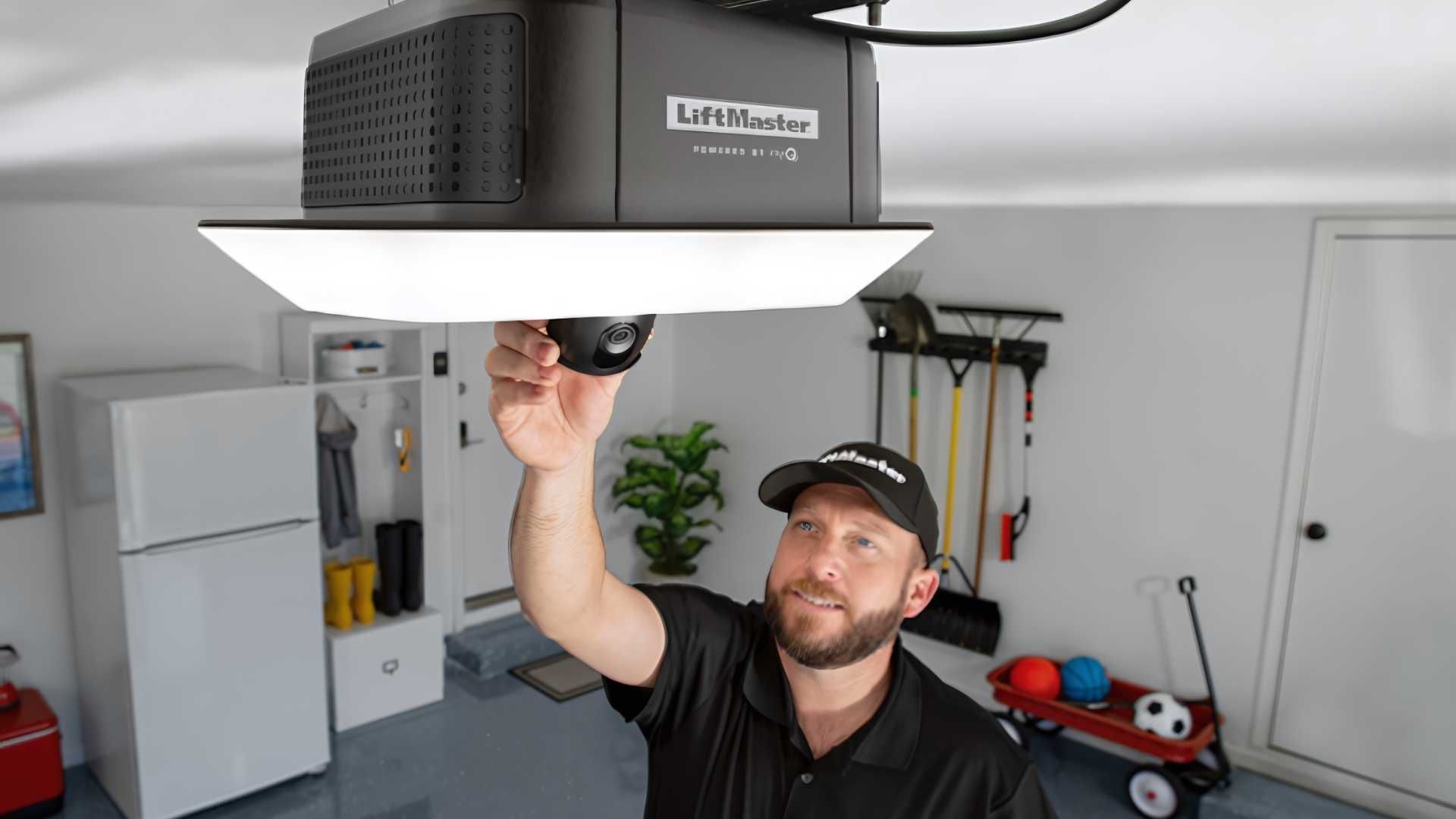 an image that shows a person fixing garage door opener and represents contact us