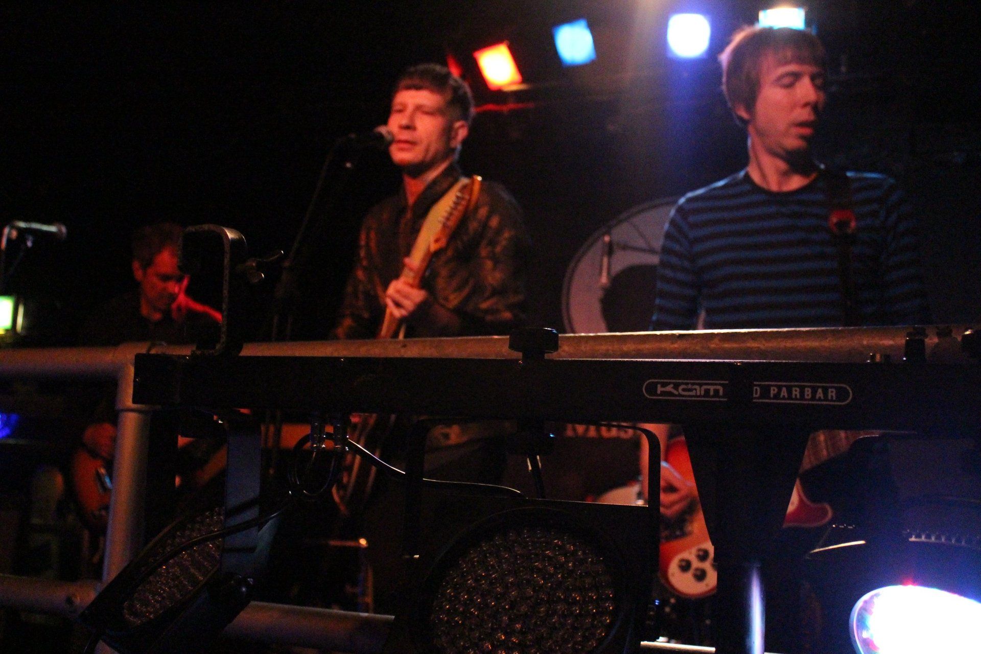 A man playing a keyboard that says casio on it