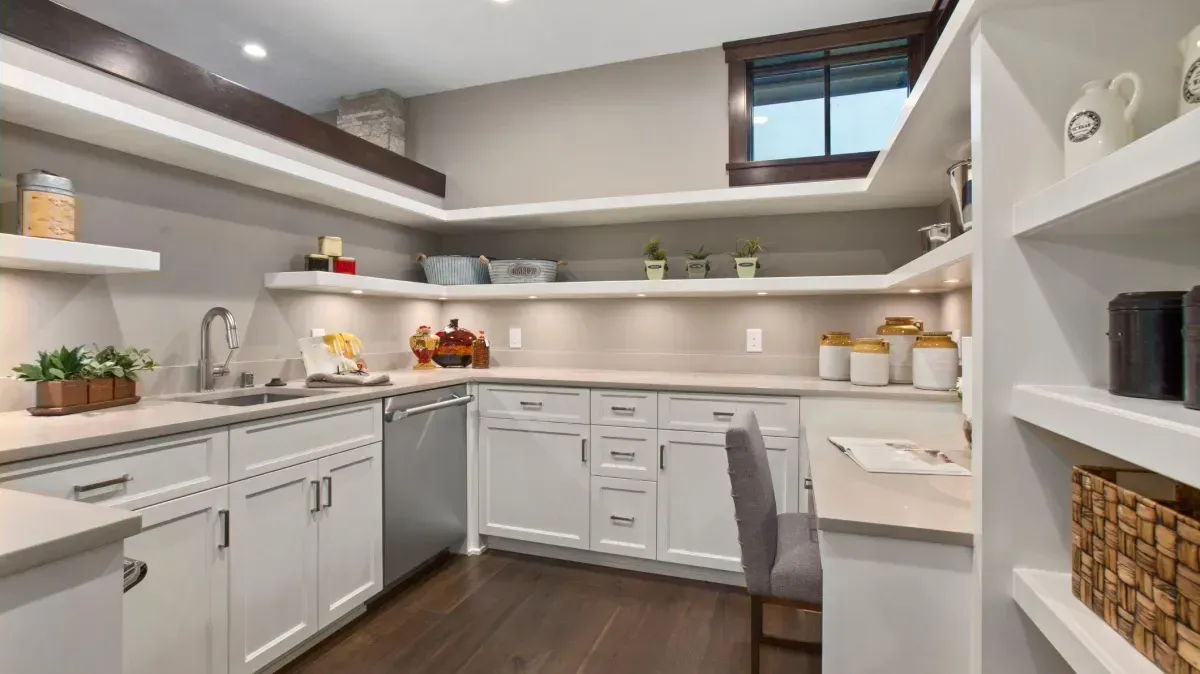 Bright kitchen featuring custom refinished cabinets with a modern, refreshed look.