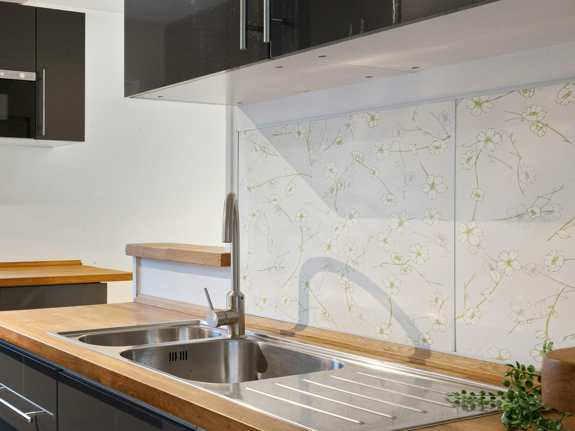 Kitchen with white subway tile backsplash installed by Urbane Upgrade in Carmel IN home