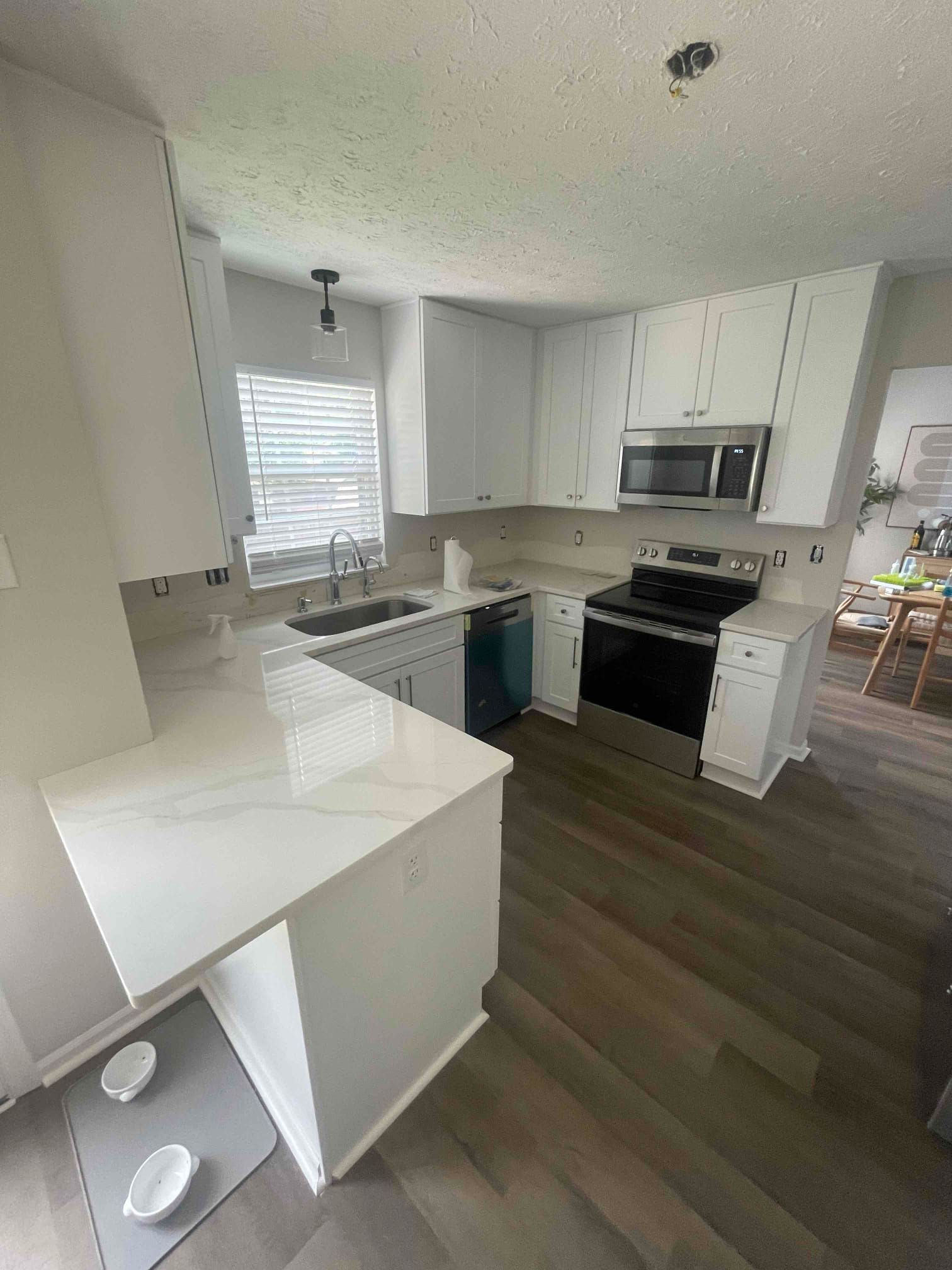 new u-shaped countertop and kitchen rebuild