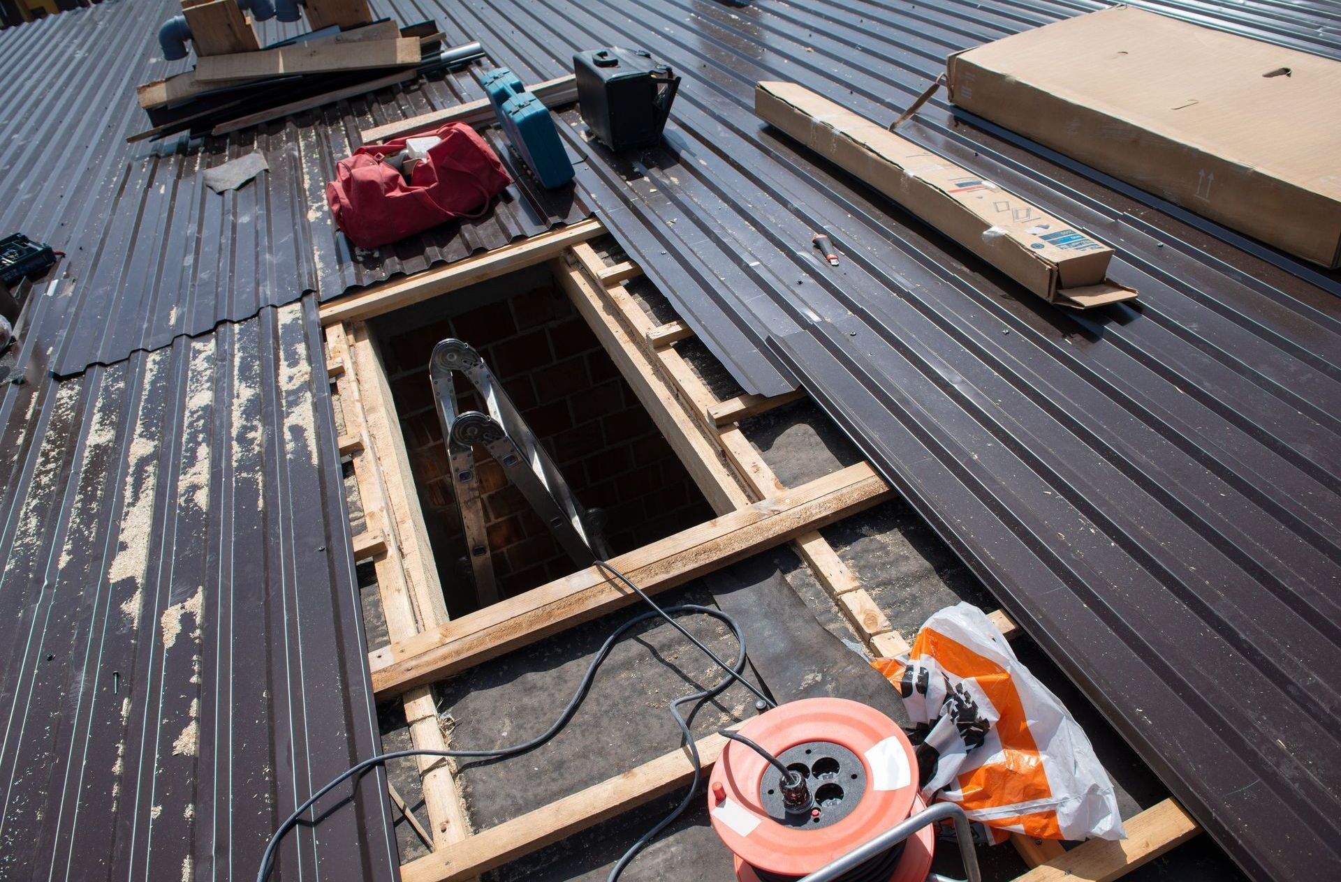 A hole in the roof of a building being built