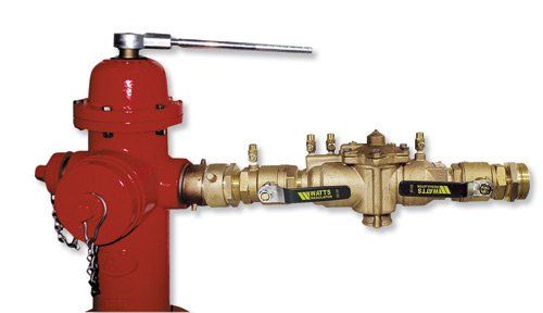 A red fire hydrant with a valve attached to it
