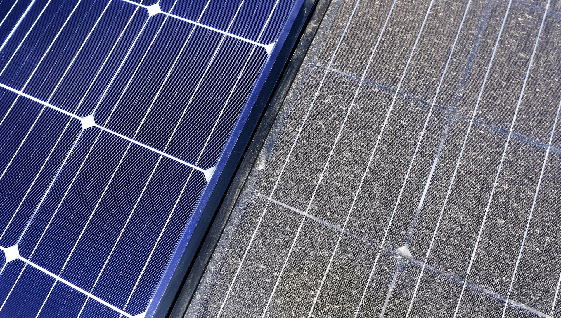 A split view showing a clean, blue solar panel next to a heavily dust-covered and dirty panel.