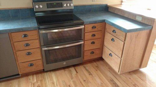 Custom cabinets around an over - Cabinets in Springfield, OR