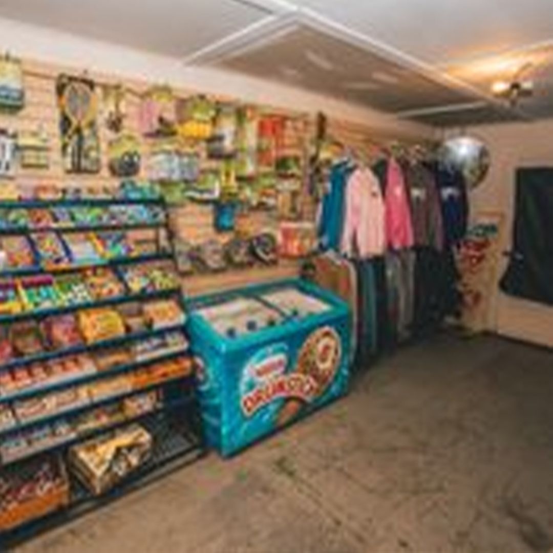 a store filled with lots of clothes and ice cream .