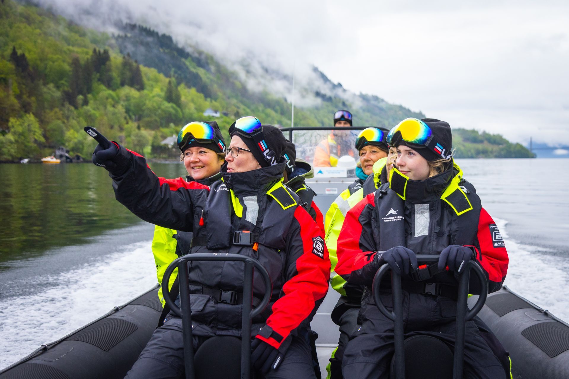 People enjoying a RIB tour on the Hardangerfjord