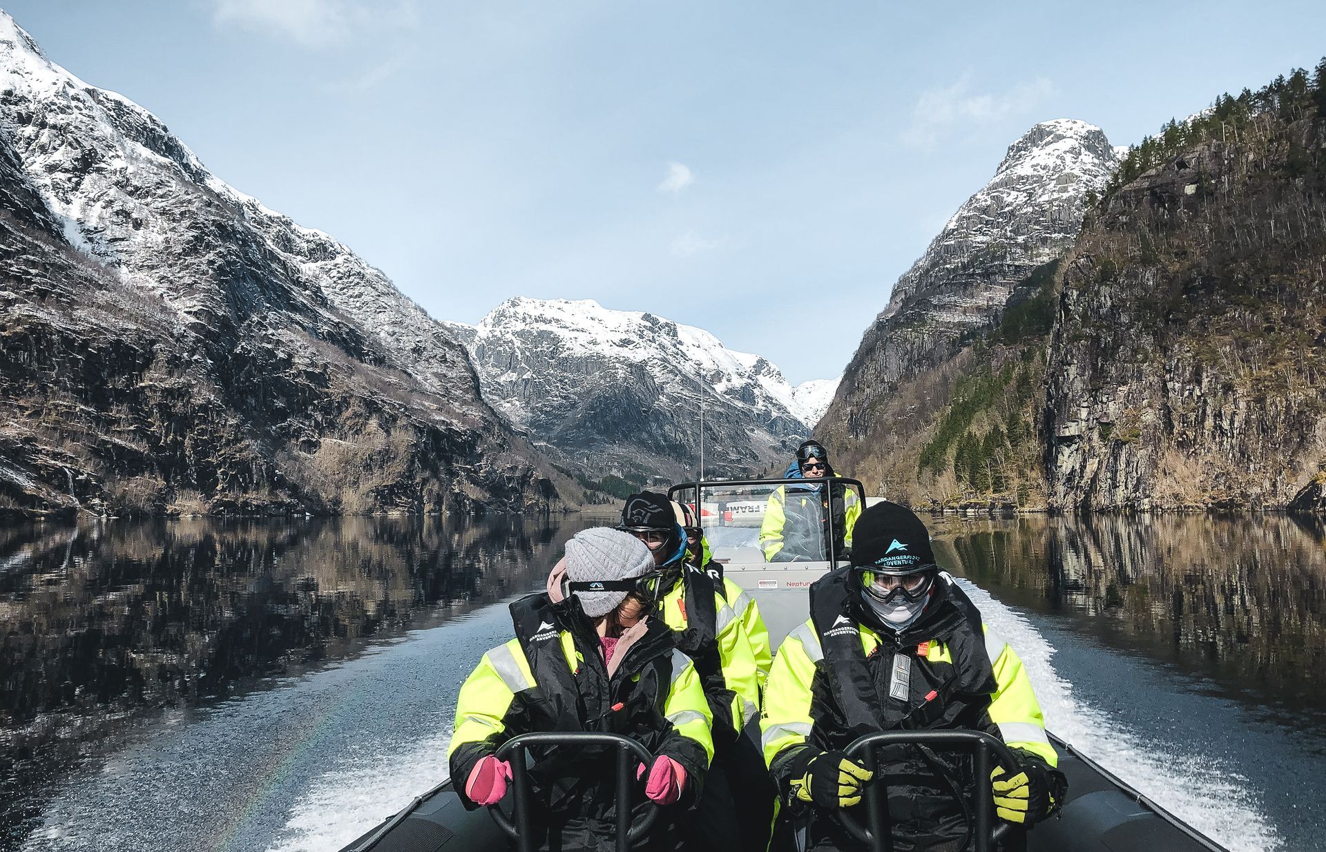 People on a RIB boat in wintertime