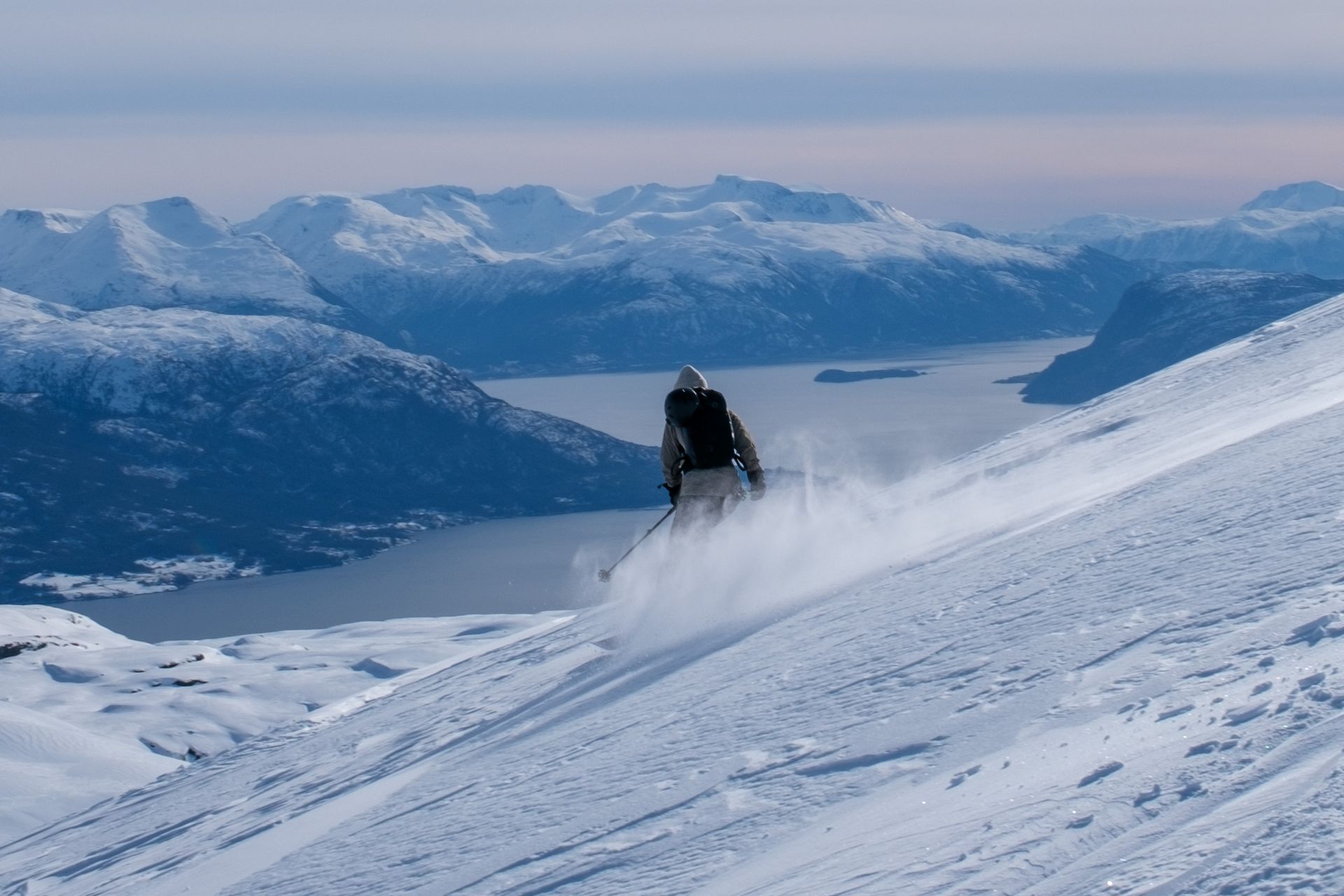 Skiing down Hardangefjord peaks