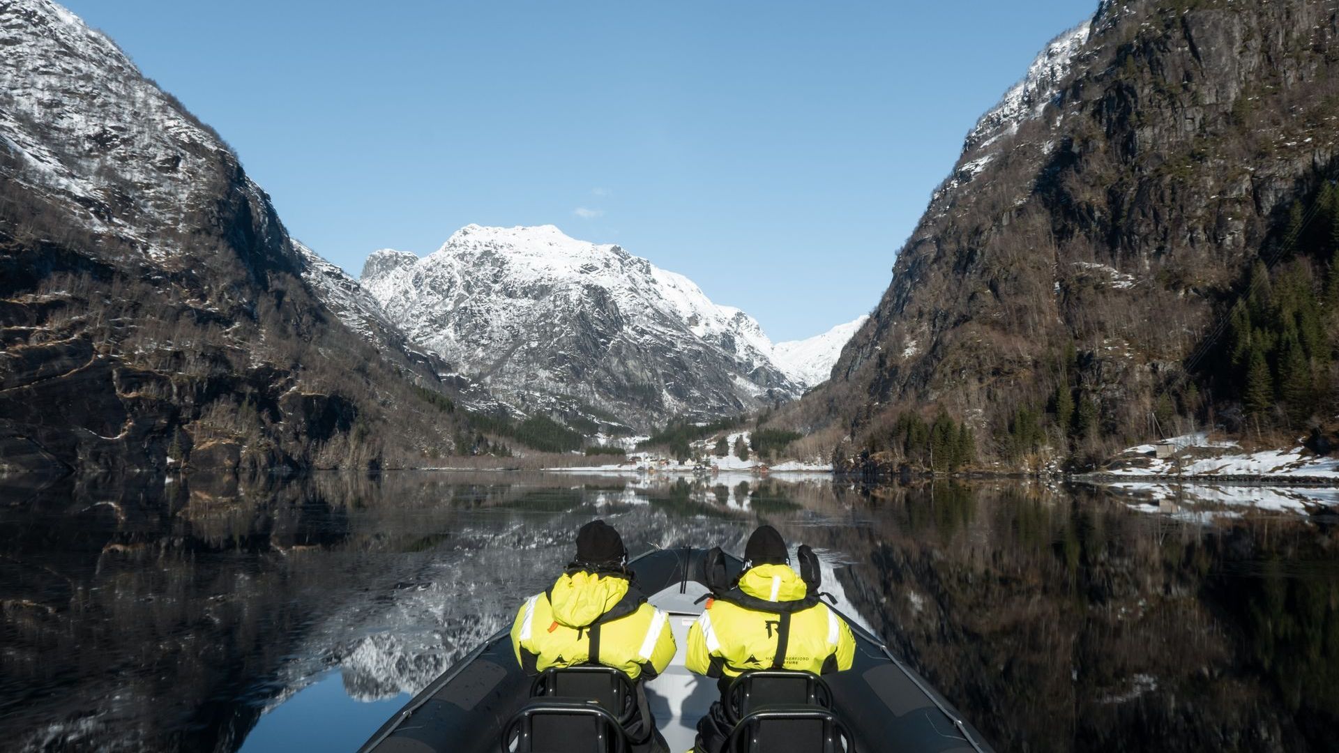 RIB boat by a waterfall in Fyksesund