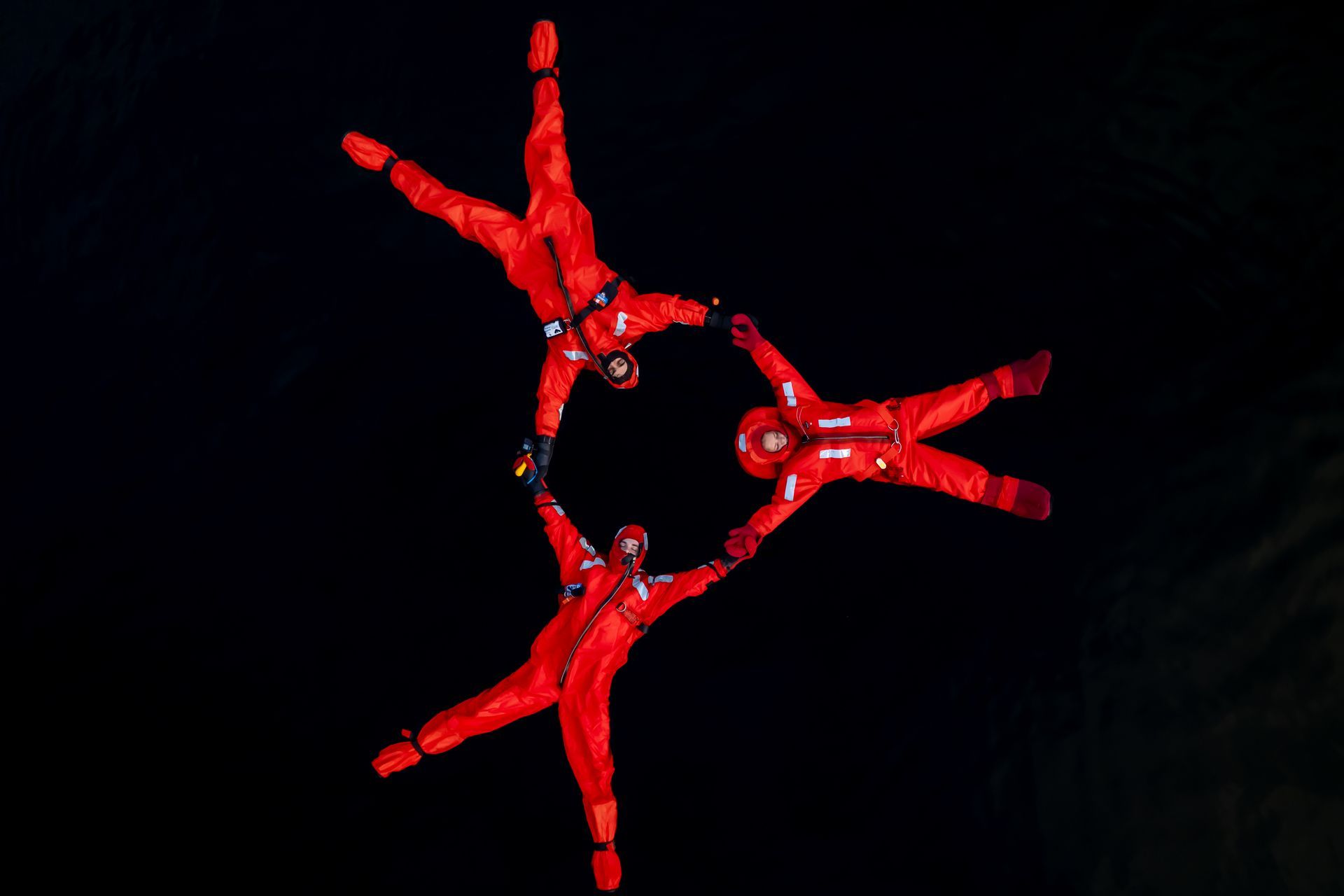 People floating in the fjord on a peaceful winter day