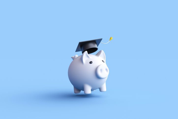 piggy bank with a graduation cap
