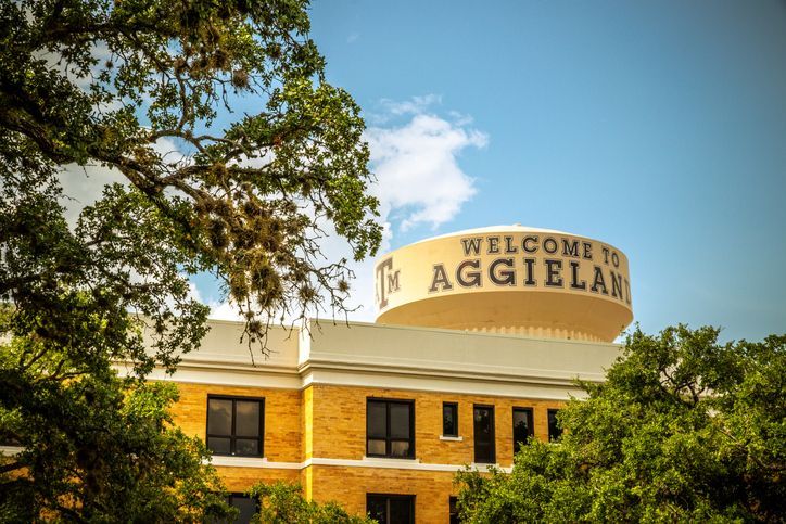 This is a photo of a building at Texas A&M that says Welcome to Aggieland.