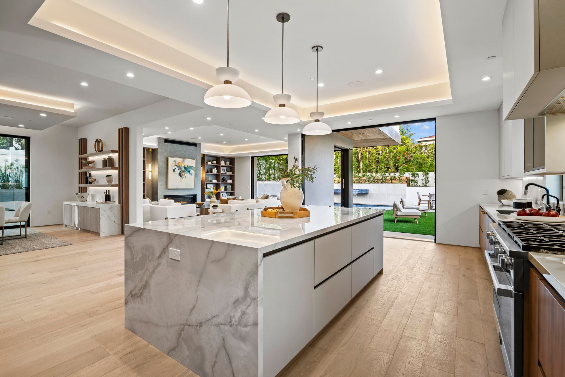 There is a large island in the middle of the kitchen.
