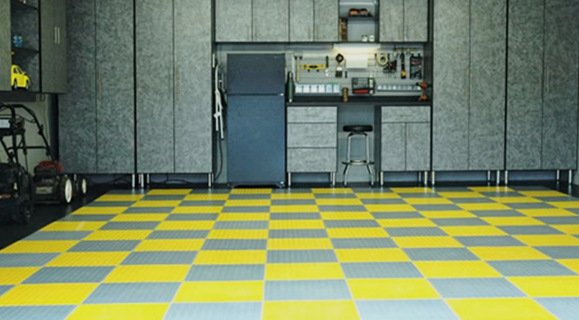 A garage with a yellow and gray checkered floor