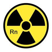 un symbole radioactif jaune et noir avec les lettres rn dessus.