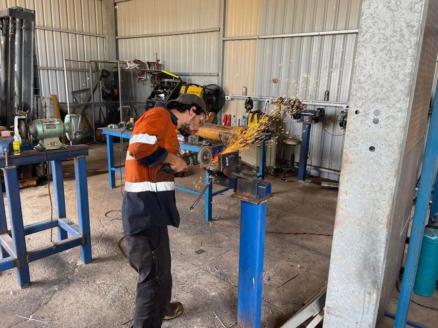 Grinding Metal — Diesel Repairs in Alice Springs, NT