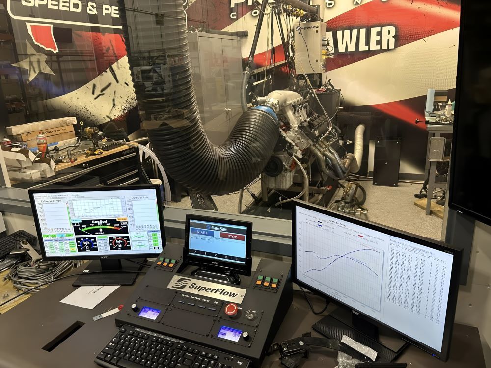 A Computer Desk With Two Monitors and a Keyboard — Diesel Repairs in Alice Springs, NT