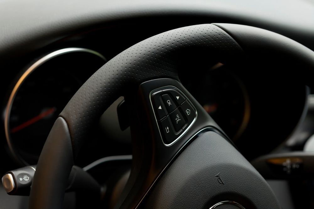 Close-up of a Black Car Steering Wheel — Van Diemen's Automotive & Electrical Repairs In Bellerive, TAS