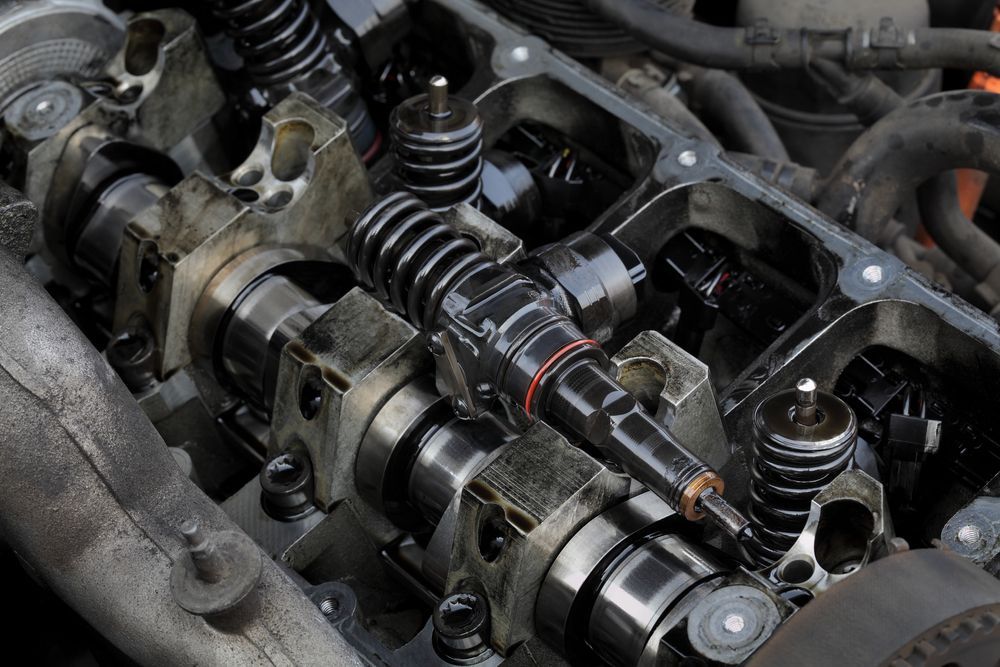Engine Cylinder Head With Camshafts, Valves, and Greasy Metal Components — Van Diemen's Automotive & Electrical Repairs In Bellerive, TAS