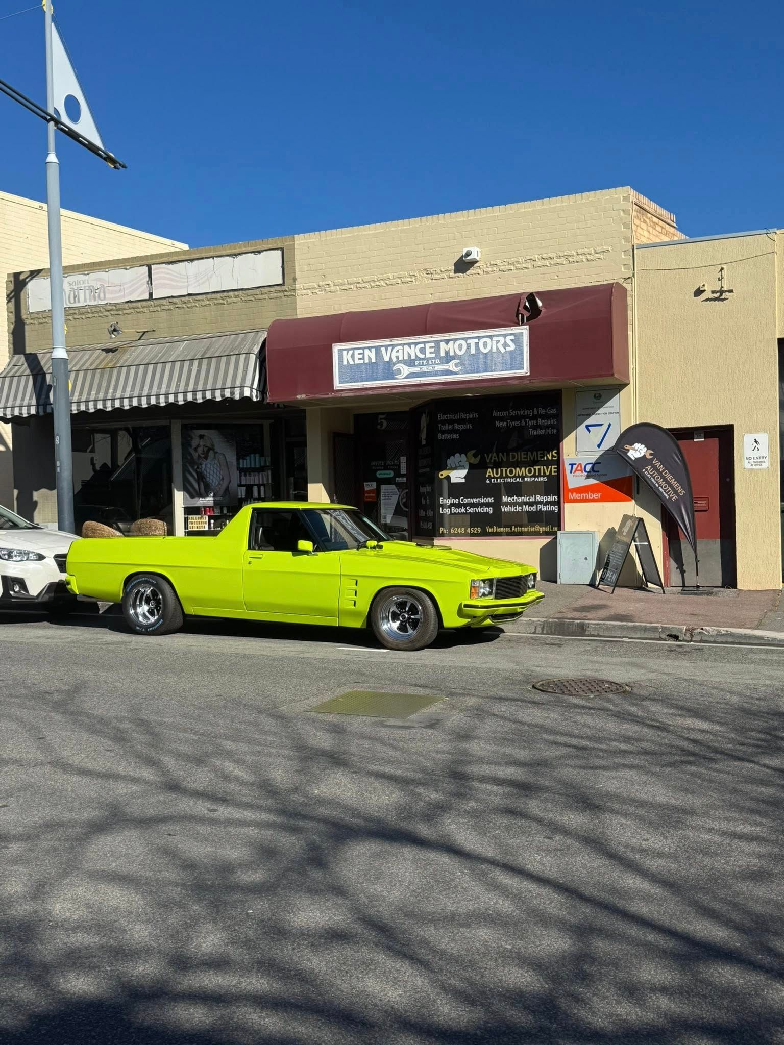 Sports Car Dealership With Three Red Cars  — Van Diemen's Automotive & Electrical Repairs In Bellerive, TAS