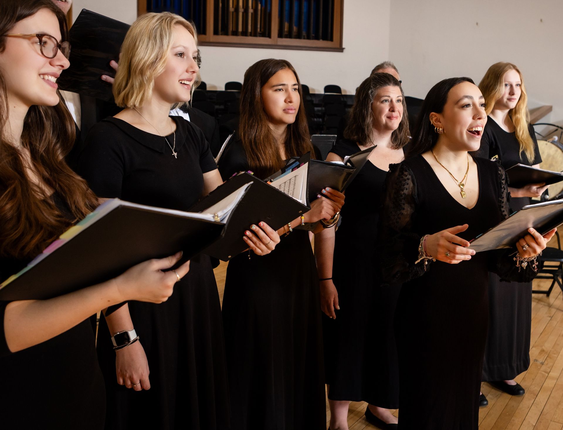 Bethany College choir members performing on Presser Hall stage