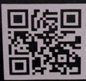 A black and white QR code.