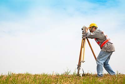 man surveying the land man surveying the land
