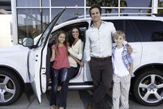 Family with a white car - Auto Insurance in Santa Fe, NM