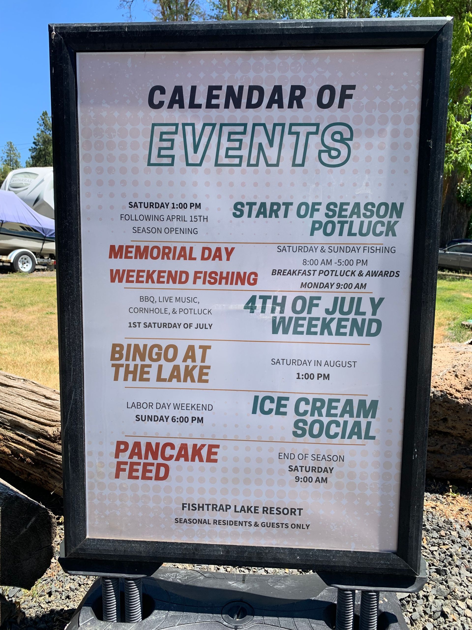 Calendar of Events sign listing events like Memorial Day weekend fishing, Bingo, and Ice Cream Social.
