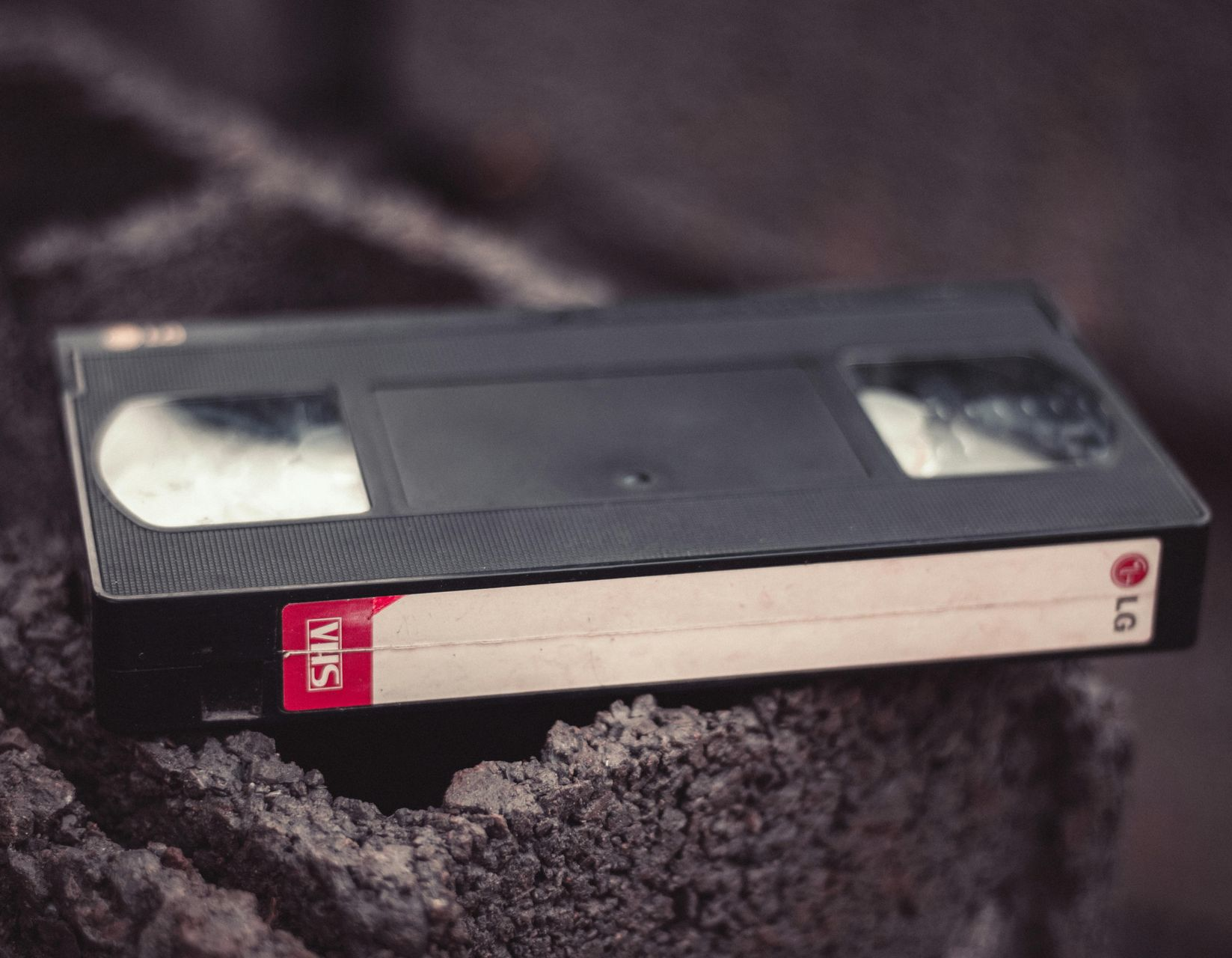 a scotch vhs tape sits next to its box