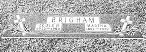 A headstone of Louis and Martha Brigham. 