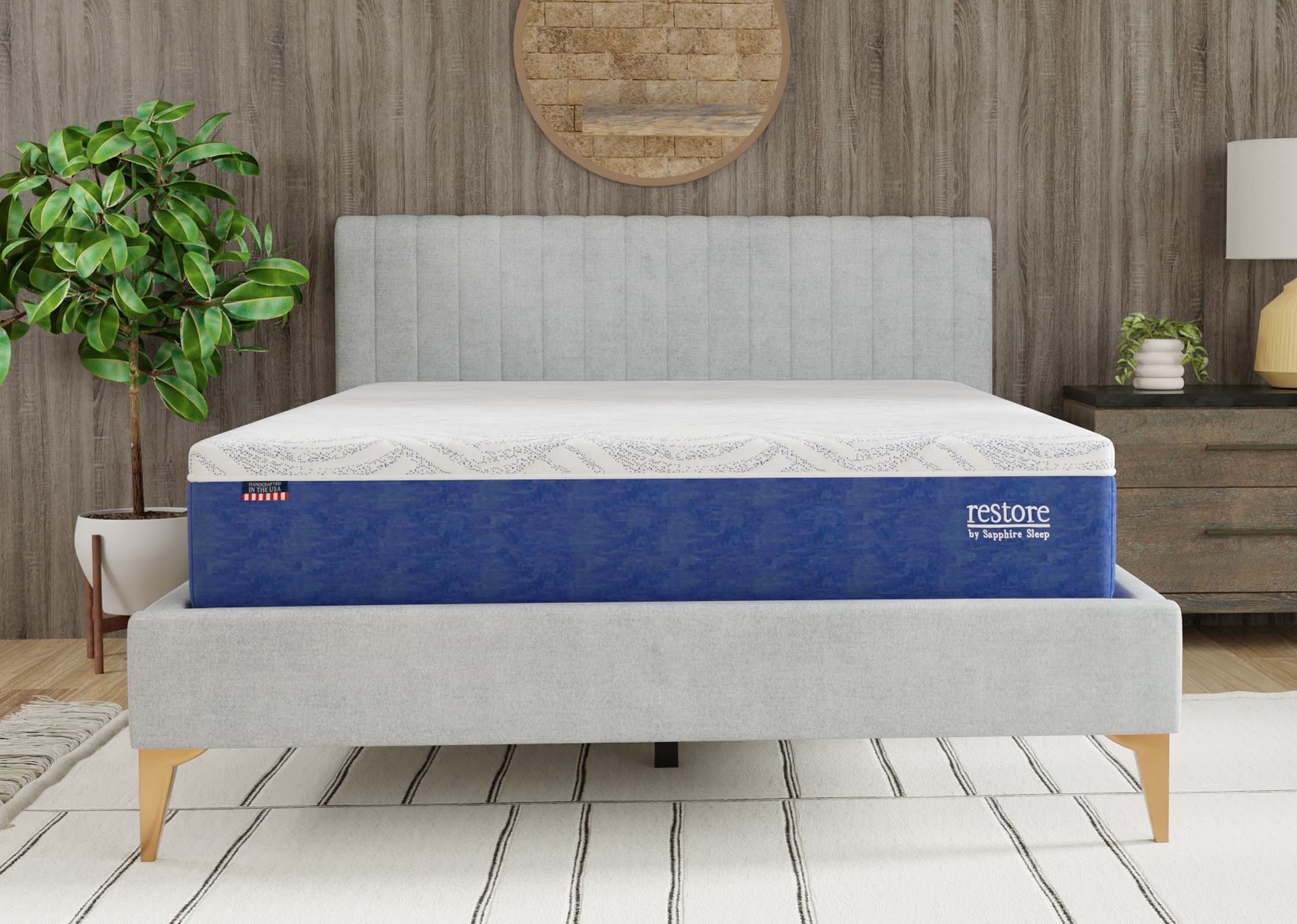 A mattress with a white patterned top on a wooden bed frame in a store.
