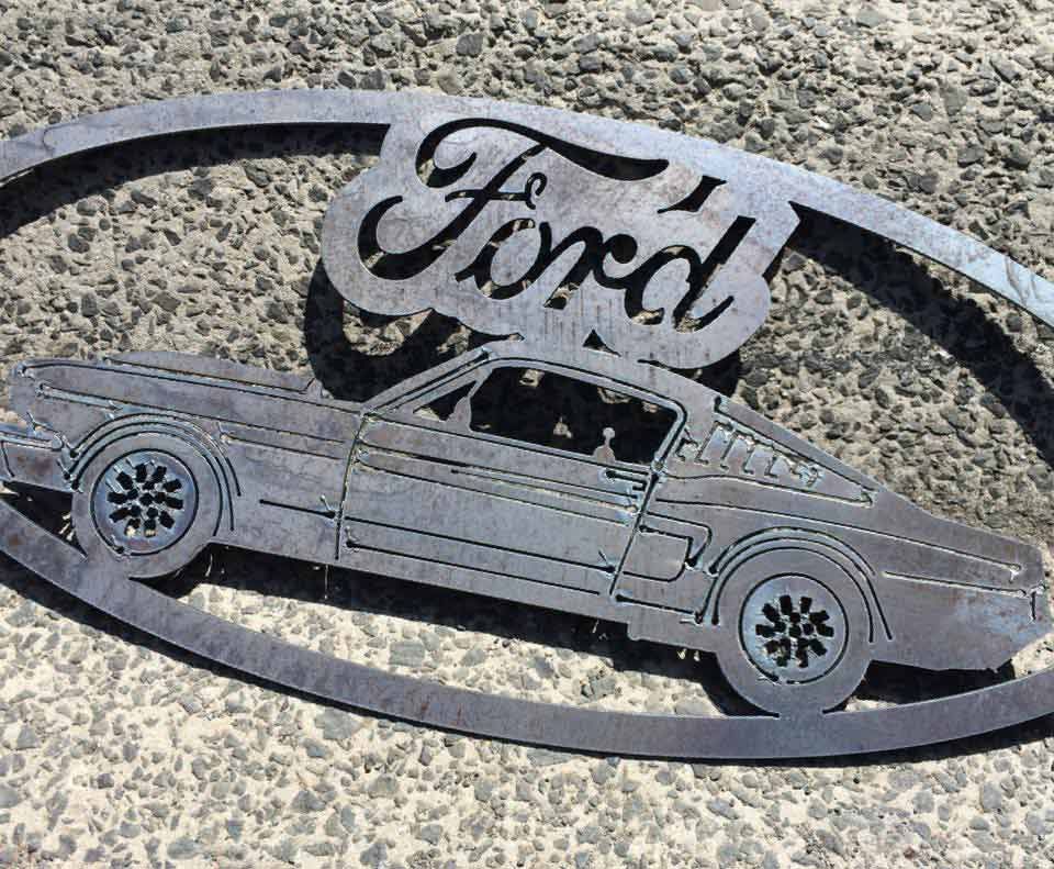 Metal Ford Logo Crafted with Precision at XPiggy Customs: CNC Waterjet, Plasma Cutting & Laser Engraving Services — Engraving in Illawarra Region, NSW