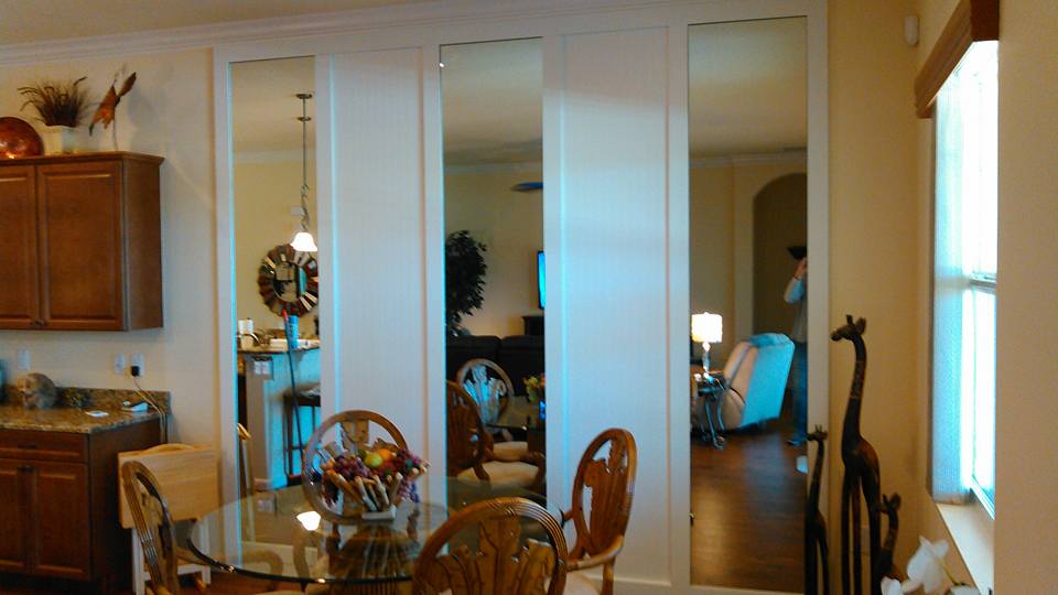 The Rostas Group Glass — Interior of a Hall with Mirror in Palm Bay, FL