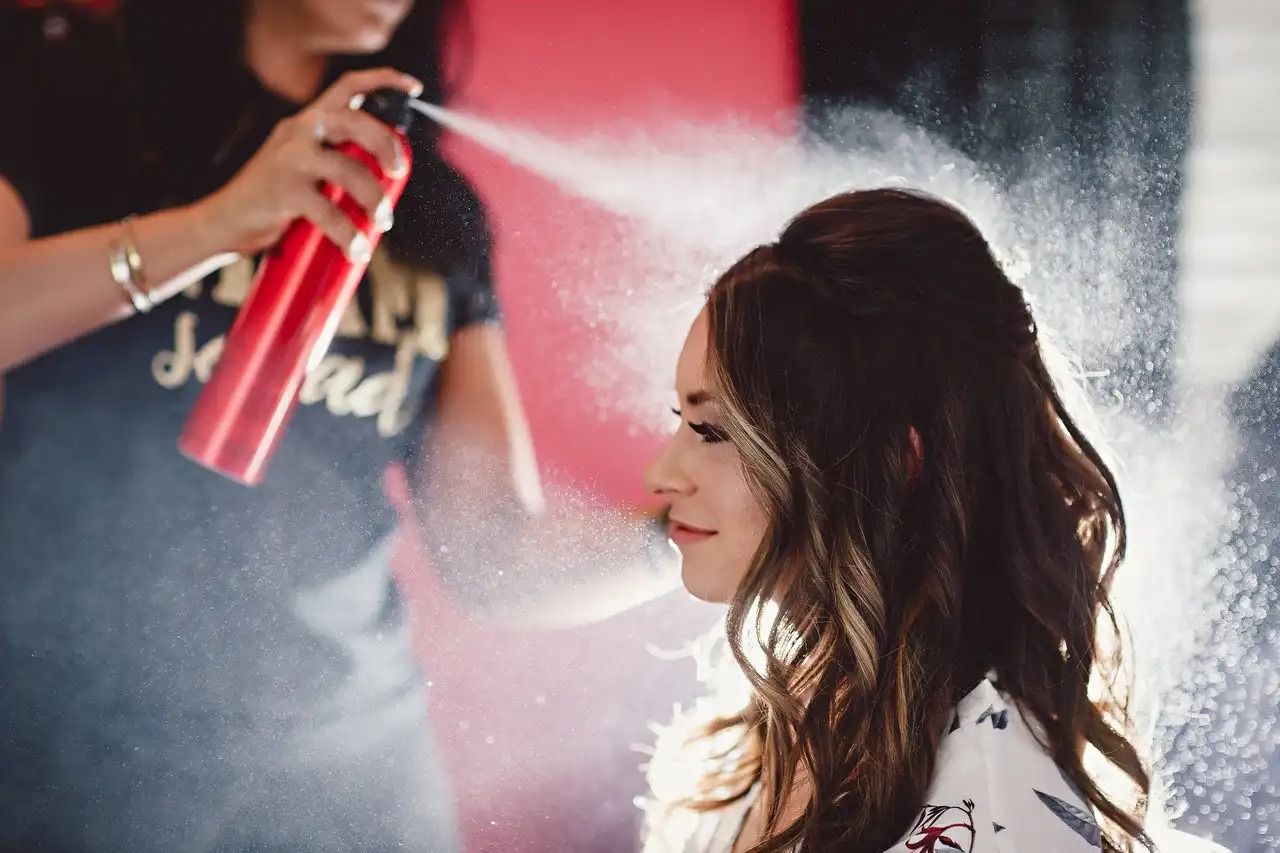 Spraying Styler on Hair